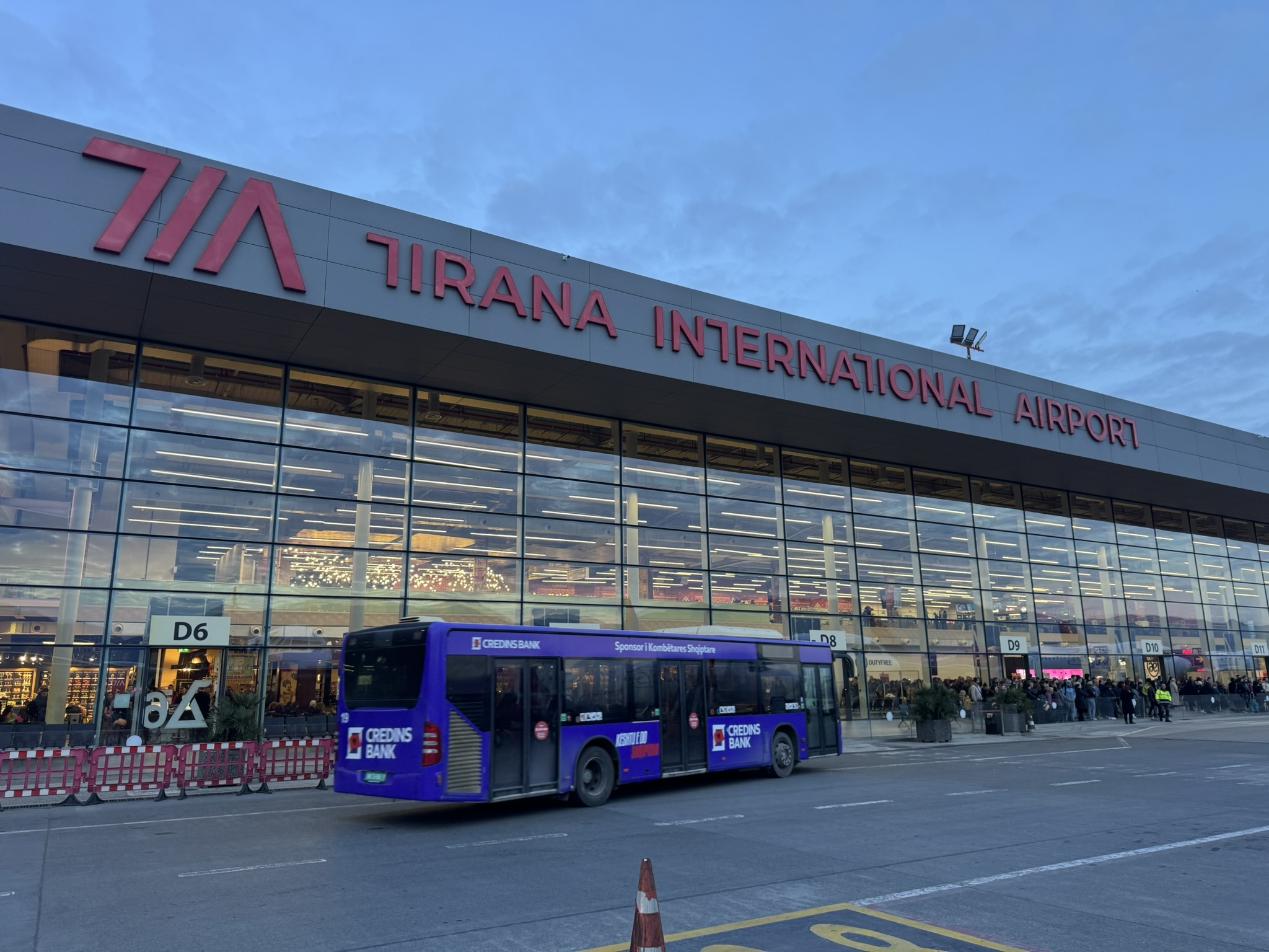Tirana International Airport exterior before the family France road trip flight