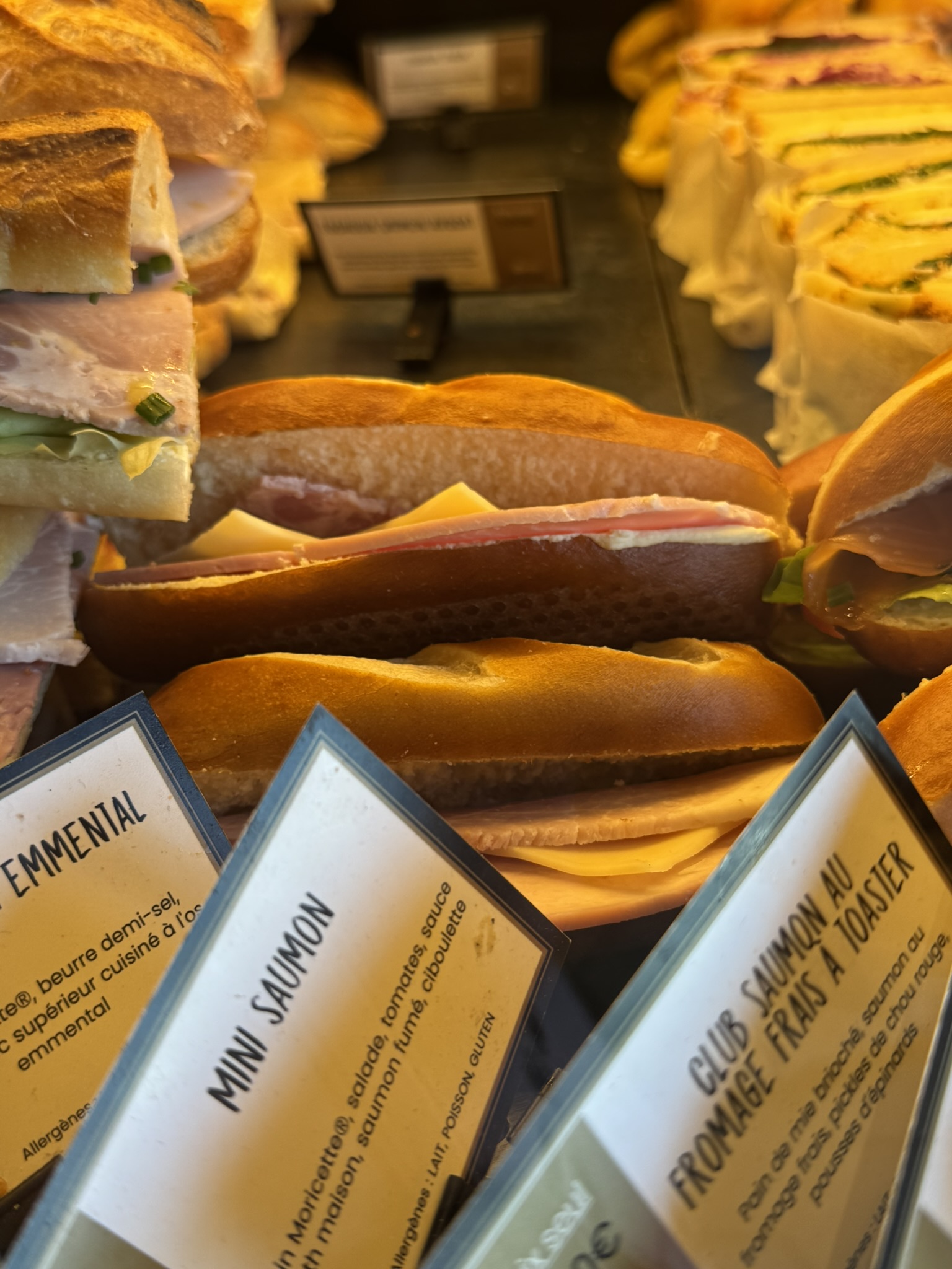 Fresh baguettes and pastries at Boulangerie Feuillette on a France road trip to Normandy