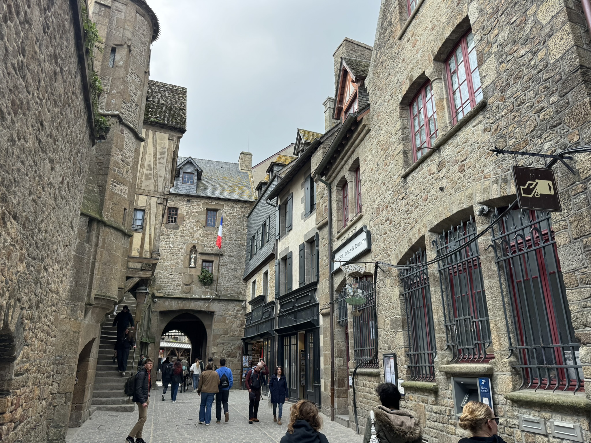 Stone street inside Mont Saint Michel village on a family France road trip