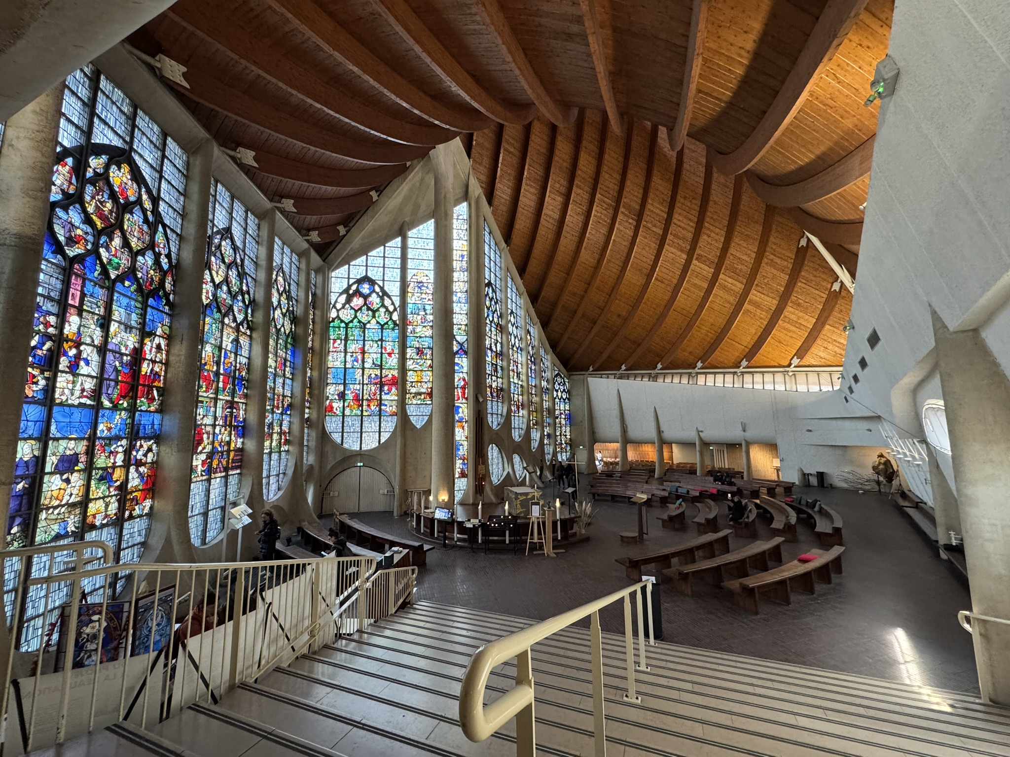 Interior of Saint Joan of Arc Church in Rouen with stained glass windows