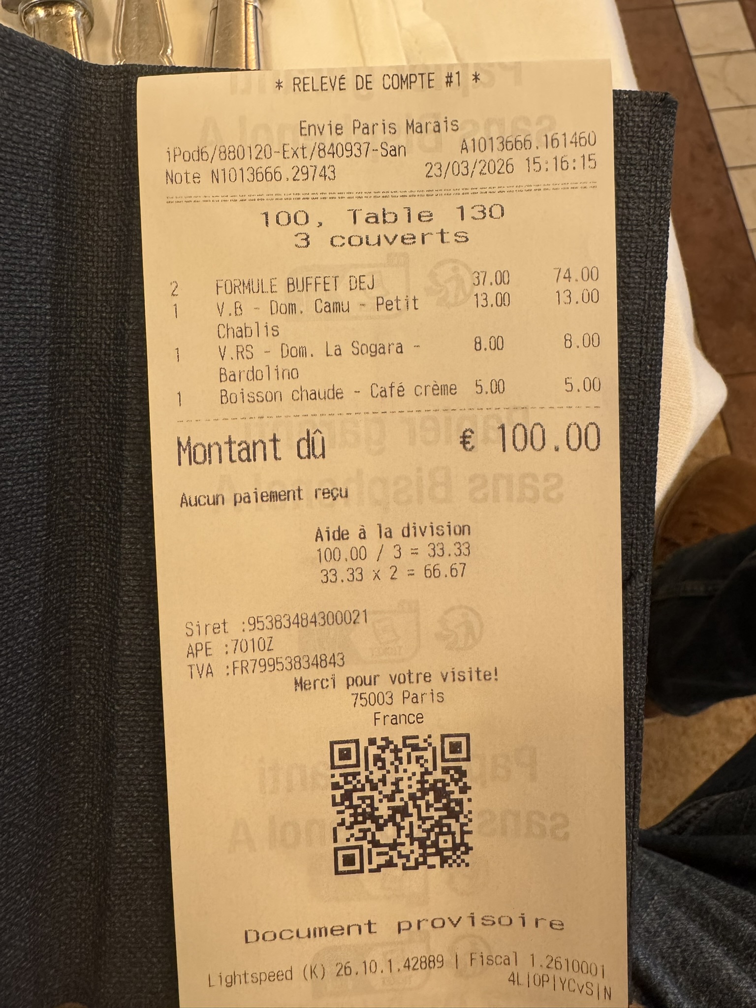 Paris buffet receipt showing 100 euro meal for three on a family France road trip