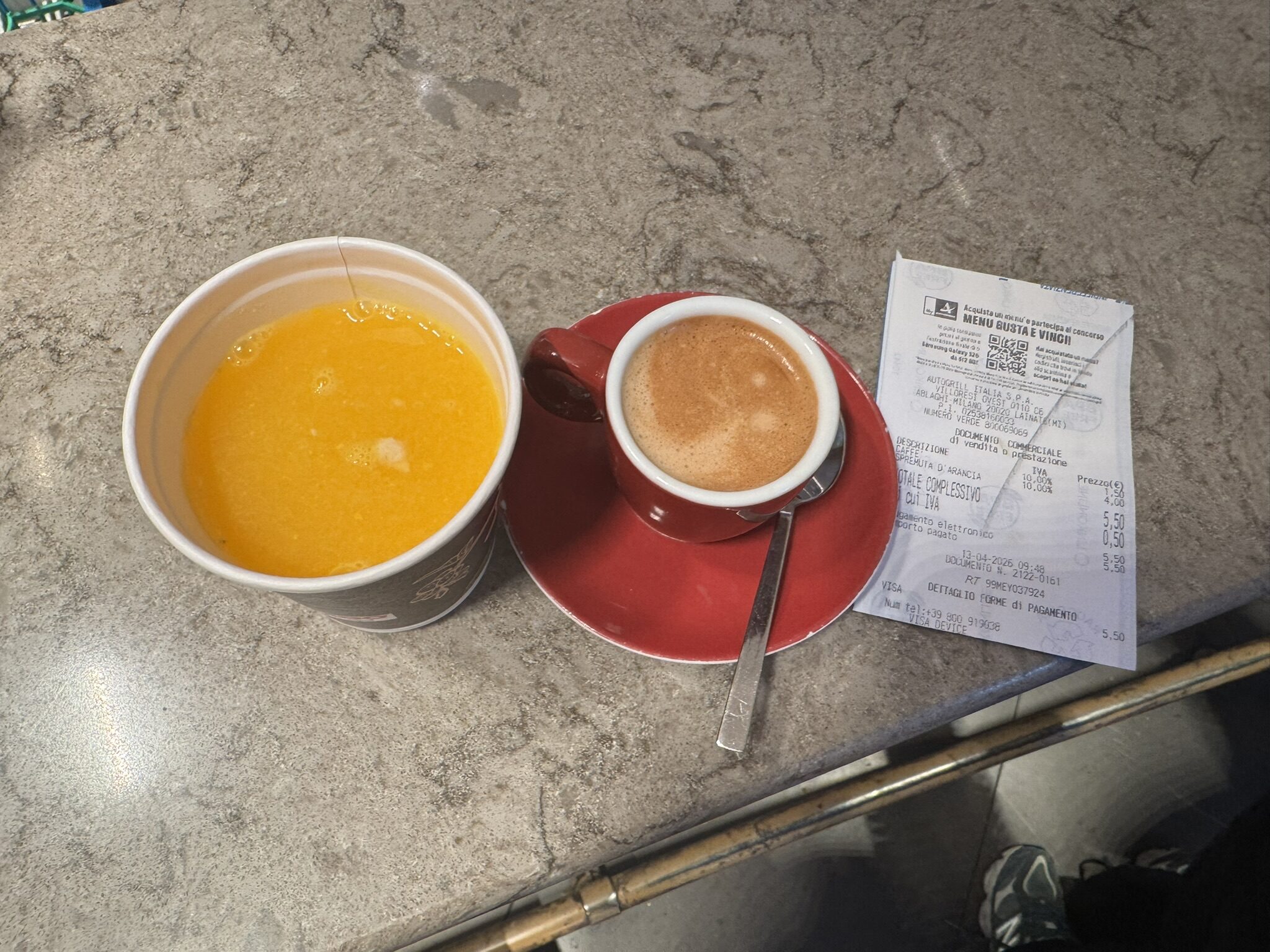 Espresso and blood orange juice at an Italian motorway cafe.