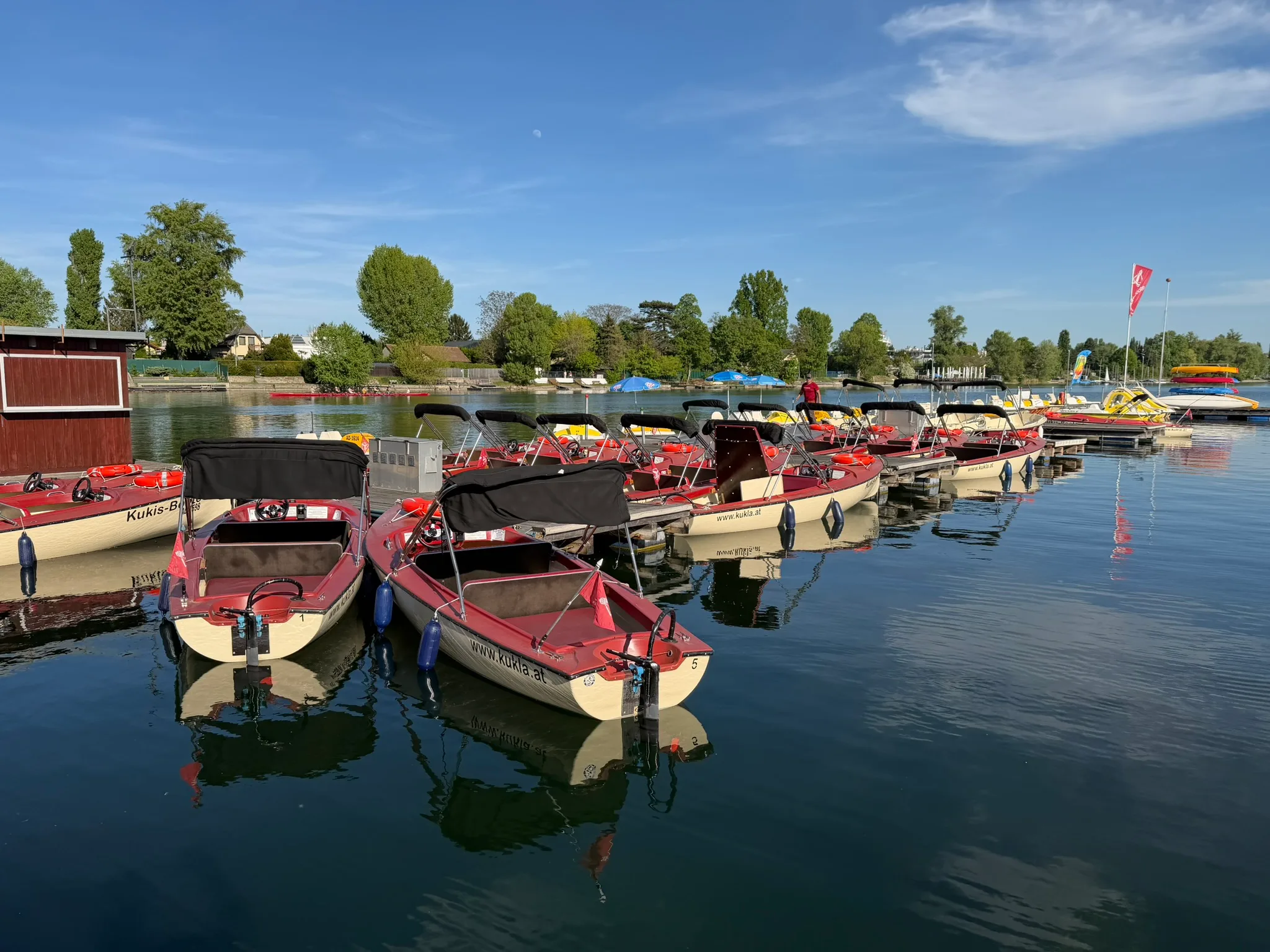 Alte Donau rental boats in Vienna used as a family-friendly activity in a Central Europe itinerary