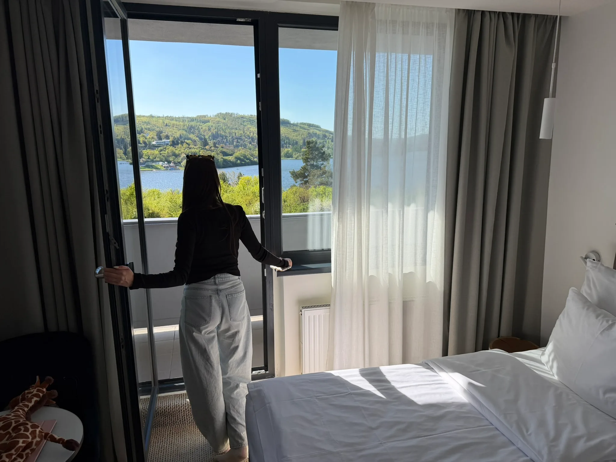 OREA Resort Santon room balcony overlooking Brno Reservoir during a real Central Europe family trip