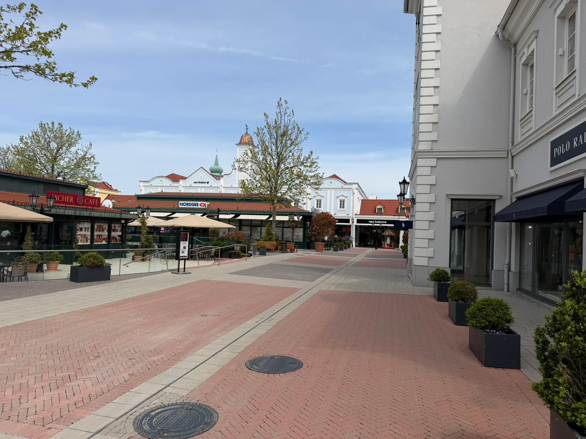 Parndorf Designer Outlet street view during shopping.